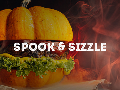 Picture of a cheeseburger with a pumpkin for a bun.